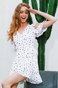 Super cute polka dot, v-neck, ruffle, off the shoulder, wrap style dress.